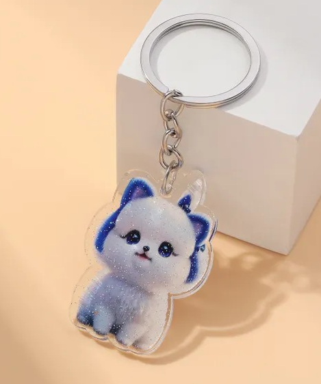 Porte-clés petit chien Mignon  a reflet pailleter Bleu Royal